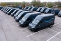 A fleet of Amazon Prime delivery vans