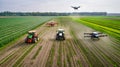 A fleet of automated tractors and drones working together in a large farm field. The image highlights the efficiency and precision