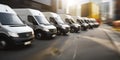 A fleet of delivery vehicles with their engines revving, displayed against a dynamic, fast-paced background, concept of Royalty Free Stock Photo