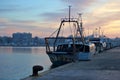 Fleet of fishing boats docked at the Santa Pola harbor at dawn Royalty Free Stock Photo