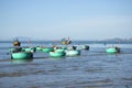 Fleet round plastic boats after fishing in the Fishing harbour of Mui Ne. Vietnam