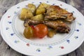 Baked guinea fowl with potatoes and Cremona mustard rosemary