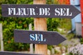 Fleur de sel french text panel sign arrow means flower of salt sea white Royalty Free Stock Photo