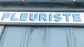 Fleuriste french text means florist flowers shop sign facade boutique of store flower in retro vintage facade Royalty Free Stock Photo