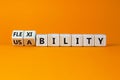 Flexibility and usability symbol. Turned wooden cubes and changed words `usability` to `flexibility`. Beautiful orange backgro Royalty Free Stock Photo