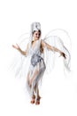 Beautiful young woman in carnival, stylish masquerade costume with feathers dancing on white studio background. Concept Royalty Free Stock Photo