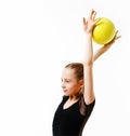 Flexible cute little girl child gymnast doing acrobatic exercise with ball isolated on a white background Royalty Free Stock Photo