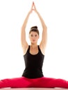 Flexible girl doing stretching pilates exercise