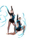 Flexible gymnasts dancing with blue ribbons