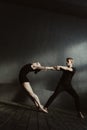 Flexible gymnasts stretching in interaction with each other