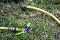 Flexible hoses for water on the grass. Nozzle - sprinkler in the form of a pistol, connectors and adapters