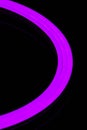 Flexible purple led tape neon flex closeup on black background Royalty Free Stock Photo