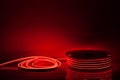 Flexible red LED neon strip on black background Royalty Free Stock Photo