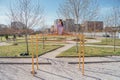 Full length photo of smiley sports girl doing splits exercises on a sports bar Royalty Free Stock Photo