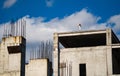 Flexible woman standing on the edge of building under construction. Freedom, courage and willpower concept Royalty Free Stock Photo