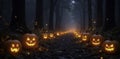 Flickering flames on pumpkins light the path through the trees with sparks, darkness, sparks Royalty Free Stock Photo