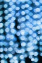 Flickering blue blurred lights of Christmas background Royalty Free Stock Photo