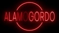 Glowing and blinking red retro neon sign for ALAMOGORDO