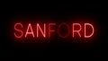 Glowing and blinking red retro neon sign for SANFORD
