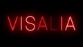 Glowing and blinking red retro neon sign for VISALIA