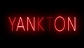 Glowing and blinking red retro neon sign for YANKTON