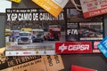Flier of Spanish championship races on the table surface with other papers