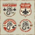 Flight academy set of vector emblems, badges, labels, logos in vintage style with grunge textures and scratches