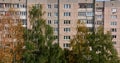 flight along a long multi-storey building with windows, balconies and loggias