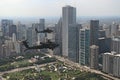 A flight of Apache helicopters fly over Downtown Chicago