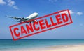 Flight cancellation. commercial airplane flight over the sea with red stamp text trip cancelled from city shutdown and border