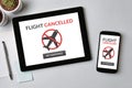 Flight cancelled concept on tablet and smartphone screen