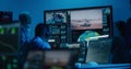 Flight control operators monitor space mission on computers in command center Royalty Free Stock Photo