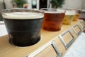 A flight of craft beer at a brewery outdoor patio