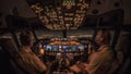 Flight Deck of a modern commercial jet transport aircraft during night cruise. Cozy airliner cockpit atmosphere generated by warm Royalty Free Stock Photo