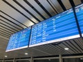 Flight departures display board at the airport terminal