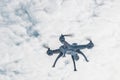 Flight of the drone in the winter forest. The concept of unmanned aerial vehicles. UAV, technology and observations
