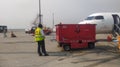 Flight Engineer and Aircraft maintenance staff conducting routine checking of the airplane.