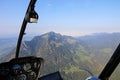 A flight with the helicopter over the Allgaeu with the mountain Gruenten