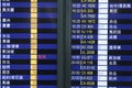 Flight information board in airport terminal