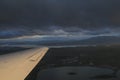 Flight Landing in Hobart in dark cloudy weather Royalty Free Stock Photo