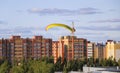 Flight of motor paraplan. a man flies on a bright colorful mot