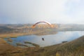 Flight on a motor paraplane above the Gorodischensky Lake Royalty Free Stock Photo