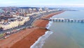 Flight over Brighton Pier and Beach in England - aerial view Royalty Free Stock Photo