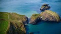 Flight over Carrick-A-Rede Rope Bridge - a famous landmark in North Ireland Royalty Free Stock Photo