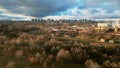 Flight over city blocks. Multi-storey buildings and construction site. Aerial photography Royalty Free Stock Photo