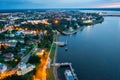 Flight over evening city of Uglich and Epiphany Cathedral on banks of Volga River