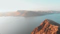 Flight over the mountain in the rays of the evening sun, a view