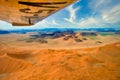 Flight over orange dunes of Sossusvlei Desert in Namib-Naukluft National Park Namibia, aerial view Royalty Free Stock Photo