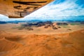 Flight over orange dunes of Sossusvlei Desert in Namib-Naukluft National Park Namibia, aerial view