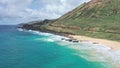 Flight over rocky coast of tropical island of Oahu Hawaii. View of Sandy Beach. Kalanianaole Highway South Shore Oahu Royalty Free Stock Photo